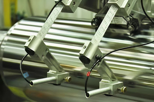 Precision run-out measurement being performed on a cooling roll during fabrication at Roll Technology